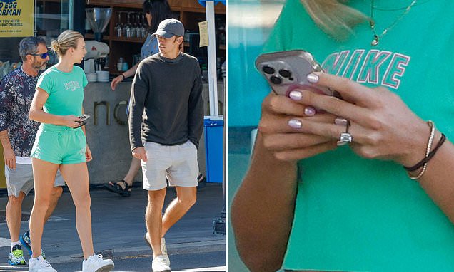 British tennis star Katie Boulter shows off her HUGE diamond engagement ring while out for