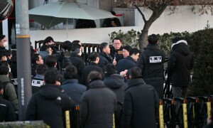 South Korean presidential guards prevent arrest of impeached Yoon after tense stand-off