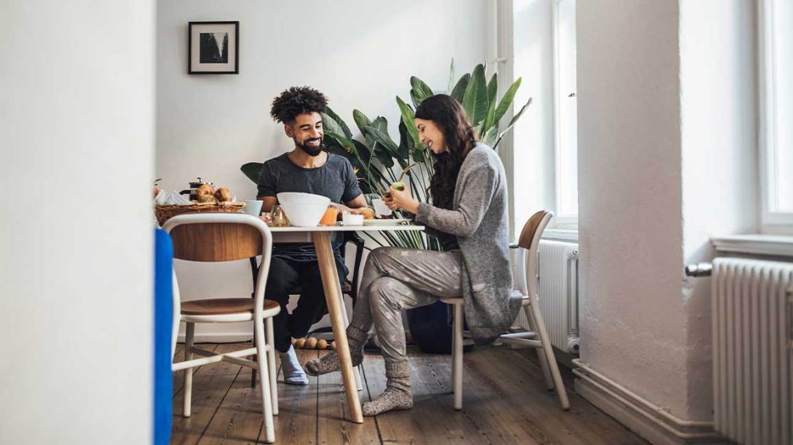 couple eating breakfast at a table