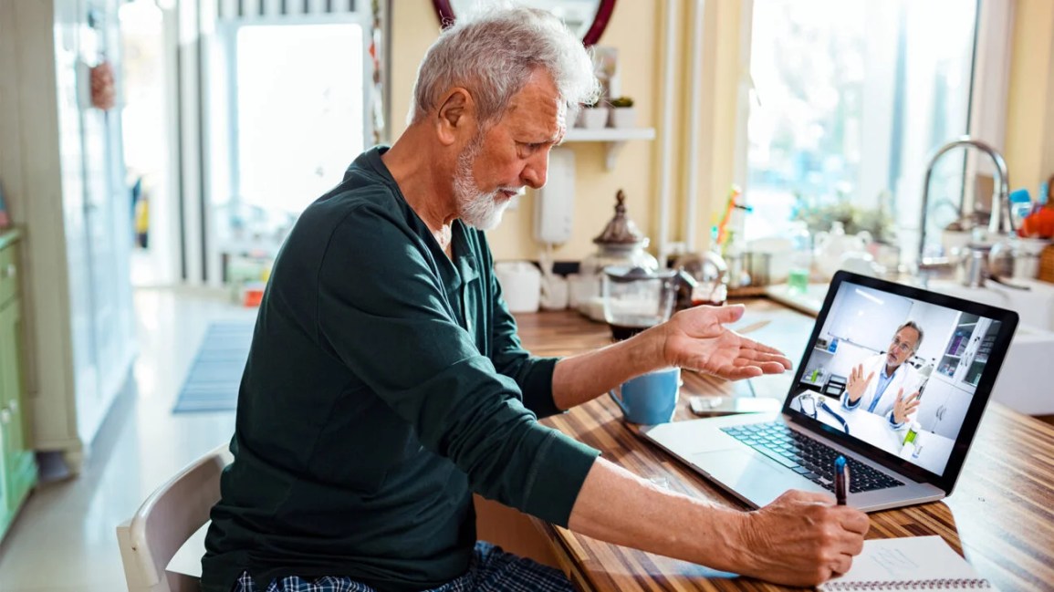 Man consulting doctor over video chat