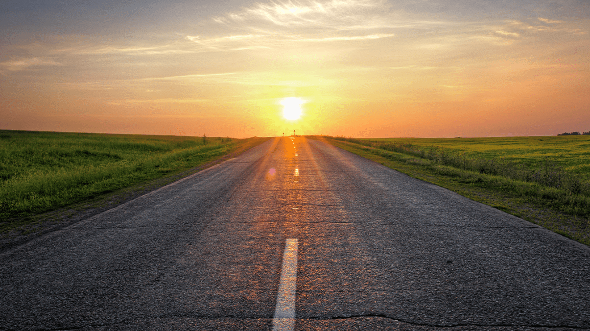 Sunlight on open road ahead