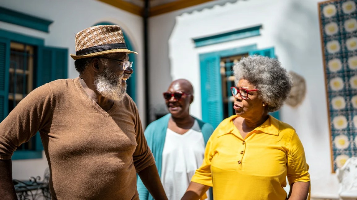 older African American adults talking with each other