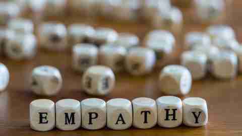 The word "empathy" arranged in letter blocks