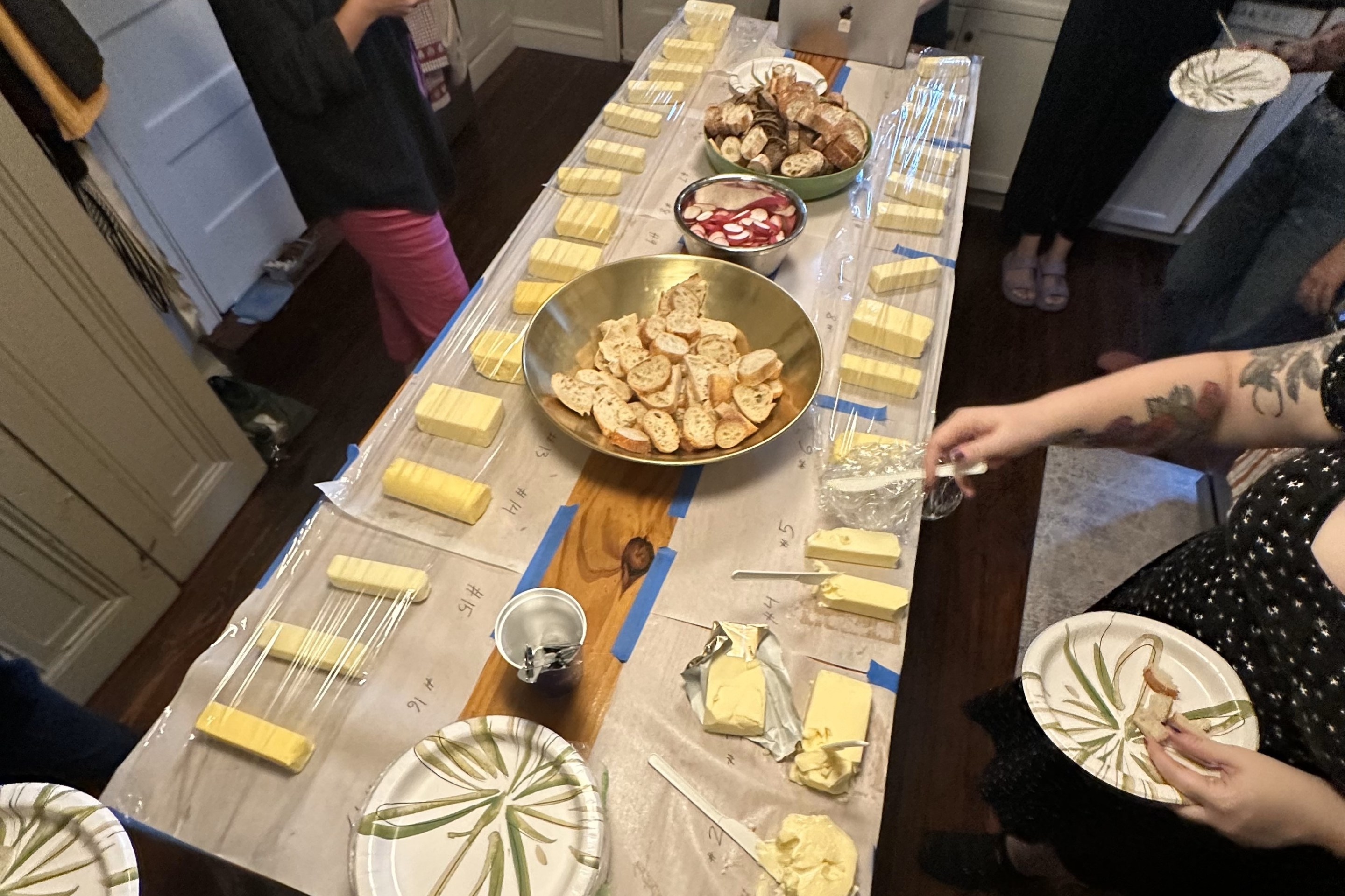 lots of butter out on a table, available for spreading