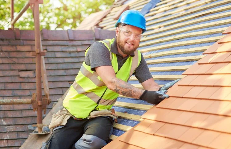 roofing marketing - Roofer working on a roof.