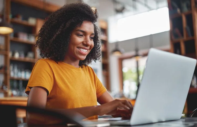 LinkedIn banner - Woman uses laptop