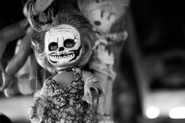 *** EXCLUSIVE *** XOCHIMILCO, MEXICO CITY - MARCH 27: A doll with skull make up appears to stare into the lens on Isla de las MuÒecas  on March 27, 2016 in Xochimilco, Mexico City.  Hidden in the Xochimilco canals is Mexicoís creepiest tourist attraction - Isla de las MuÒecas - Island of Dolls. When the islandís only occupant discovered the corpse of a drowned girl in the canal, he began hanging up dolls all over the island to ward off her spirit. A two hour trajinera ride down the canals, the island is only accessible by boat and has evolved into a terrifying destination for explorers. Photographer Sebastian Perez Lira took the ride from his home in Mexico City to capture the spooky dolls on camera. PHOTOGRAPH BY Sebastian Perez Lira  / Barcroft Images London-T:+44 207 033 1031 E:hello@barcroftmedia.com - New York-T:+1 212 796 2458 E:hello@barcroftusa.com - New Delhi-T:+91 11 4053 2429 E:hello@barcroftindia.com www.barcroftmedia.com