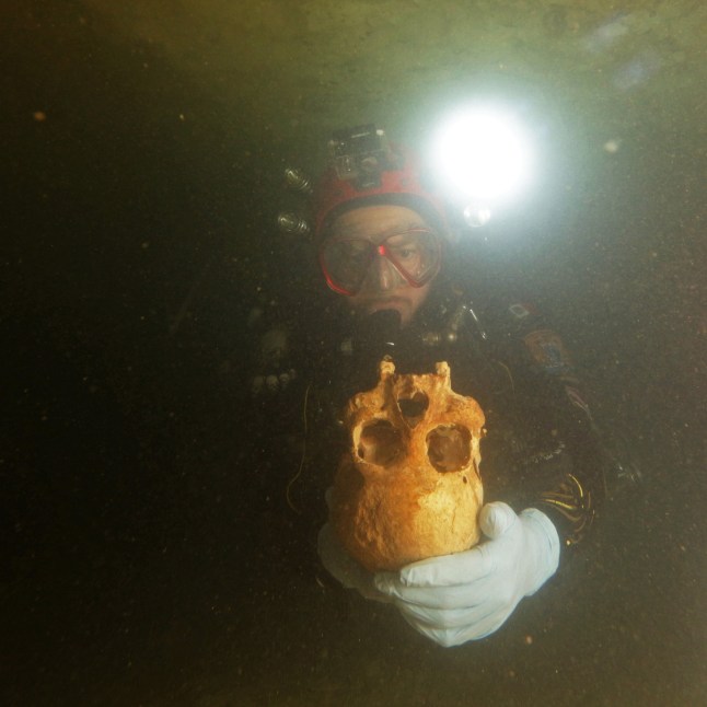 EMBARGOED TO 1900 WEDNESDAY FEBRUARY 5 Undated handout photo issued Eugenio Acevez/Plos One showing a diver exploring the underwater Chan Hol cave, near Tulum, Mexico. PA Photo. Issue date: Wednesday February 5, 2020. The 10,000-year-old skeleton discovered in Mexico has challenged the theory that humans first entered the American continents as a single population. See PA story SCIENCE Paleoindian. Photo credit should read: Eugenio Acevez/Plos One/PA Wire NOTE TO EDITORS: This handout photo may only be used in for editorial reporting purposes for the contemporaneous illustration of events, things or the people in the image or facts mentioned in the caption. Reuse of the picture may require further permission from the copyright holder.