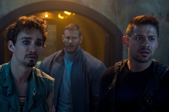 Editorial use only. No book cover usage. Mandatory Credit: Photo by C Kalohoridis/Netflix/Kobal/REX (10119076bl) Robert Sheehan as Klaus Hargreeves, Tom Hopper as Luther Hargreeves and David Castaneda as Diego Hargreeves 'The Umbrella Academy' TV Show Season 1 - 2019 A disbanded group of superheroes reunite after their adoptive father, who trained them to save the world, dies.