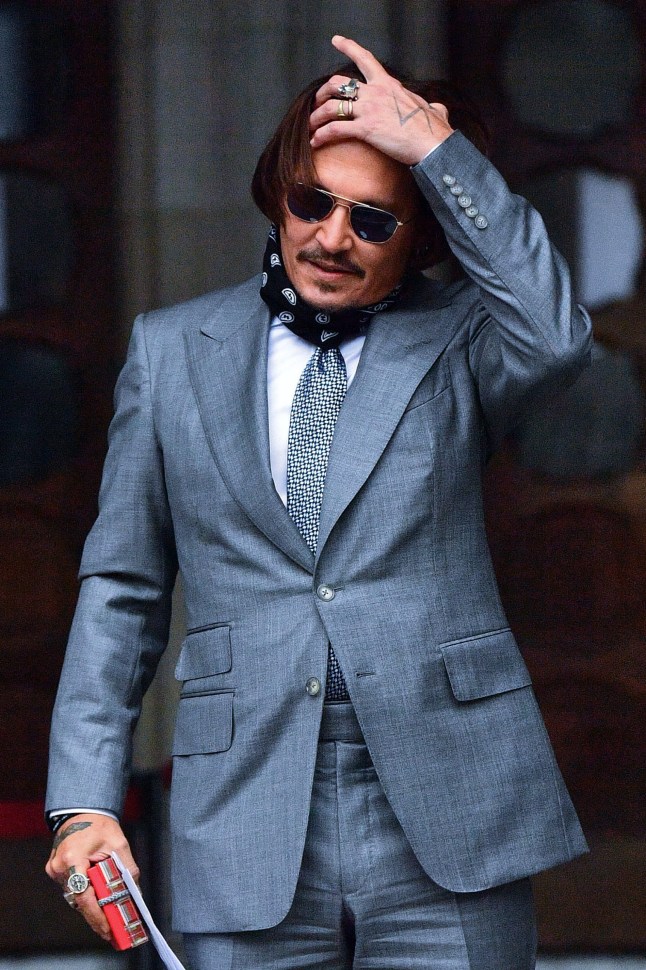 Actor Johnny Depp arrives at the High Court in London to give evidence in his libel case against the publishers of The Sun and its executive editor, Dan Wootton. PA Photo. Picture date: Thursday July 16, 2020. 57-year-old Depp is suing the tabloid's publisher News Group Newspapers (NGN) over an article which called him a "wife beater" and referred to "overwhelming evidence" he attacked Ms Heard, 34, during their relationship, which he strenuously denies. See PA story COURTS Depp. Photo credit should read: Victoria Jones/PA Wire