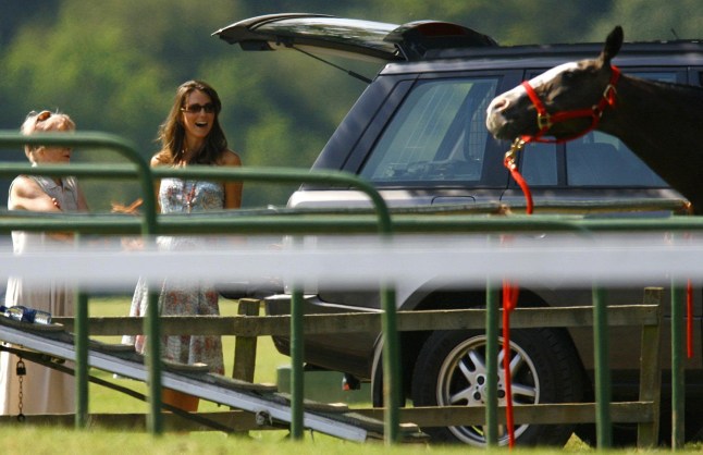 File photo dated 01/07/06 of the Duchess of Cambridge watching as the Duke of Cambridge played polo for the Highgrove team at Cirencester Park Polo Club. University student Kate Middleton first caught the attention of 19-year-old Prince William when she strode down the catwalk in a sheer dress for a charity fashion show. Issue date: Wednesday April 28, 2021. PA Photo. In their first year in 2001, William and Kate lived a few doors apart at St Salvator's hall of residence at St Andrews in Fife and became friendly, socialising together and playing tennis. See PA story ROYAL Kate Relationship. Photo credit should read: Chris Ison/PA Wire