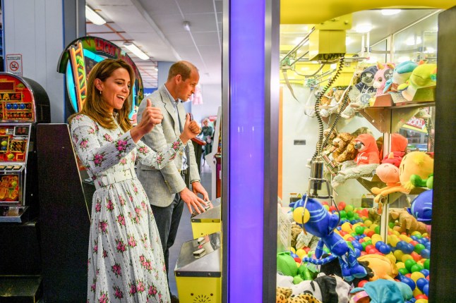 File photo dated 05/08/20 of the Duke and Duchess of Cambridge playing a grab a teddy game during their visit to Barry Island, South Wales. The Duchess of Cambridge will have spent a decade as an HRH when she and the Duke of Cambridge mark their 10th wedding anniversary on Thursday. Issue date: Wednesday April 28, 2021. PA Photo. See PA story ROYAL Kate 10Photos. Photo credit should read: Ben Birchall/PA Wire