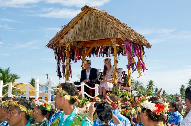 File photo dated 19/09/12 of the Duke and Duchess of Cambridge bidding farewell to Tuvalu, Soloman Islands, at the end of a nine-day royal tour of the Far East and South Pacific. The Duchess of Cambridge will have spent a decade as an HRH when she and the Duke of Cambridge mark their 10th wedding anniversary on Thursday. Issue date: Wednesday April 28, 2021. PA Photo. See PA story ROYAL Kate 10Photos. Photo credit should read: Arthur Edwards/The Sun/PA Wire