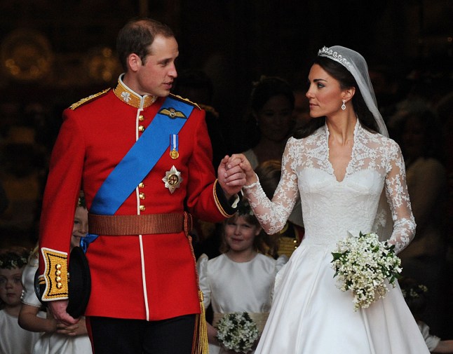 (FILES) In this file photo taken on April 29, 2011 Britain's Prince William and his wife Kate, Duchess of Cambridge, look at each other as they come out of Westminster Abbey following their wedding ceremony, in London. - Prince William and his wife Kate mark a decade of marriage on April 29, 2021, with the popular couple increasingly seen as the British monarchy's future as other senior royals age or recede from view. (Photo by CARL DE SOUZA / AFP) (Photo by CARL DE SOUZA/AFP via Getty Images)