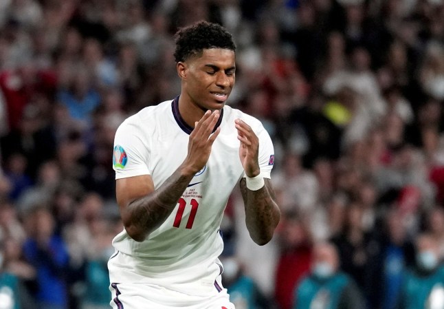 FILE PHOTO: Soccer Football - Euro 2020 - Final - Italy v England - Wembley Stadium, London, Britain - July 11, 2021 England's Marcus Rashford looks dejected after missing a penalty during a penalty shootout Pool via REUTERS/Frank Augstein/File Photo