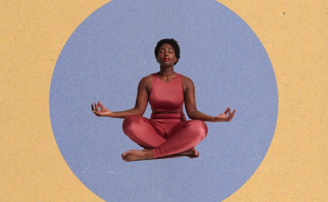 woman meditating sitting crosslegged