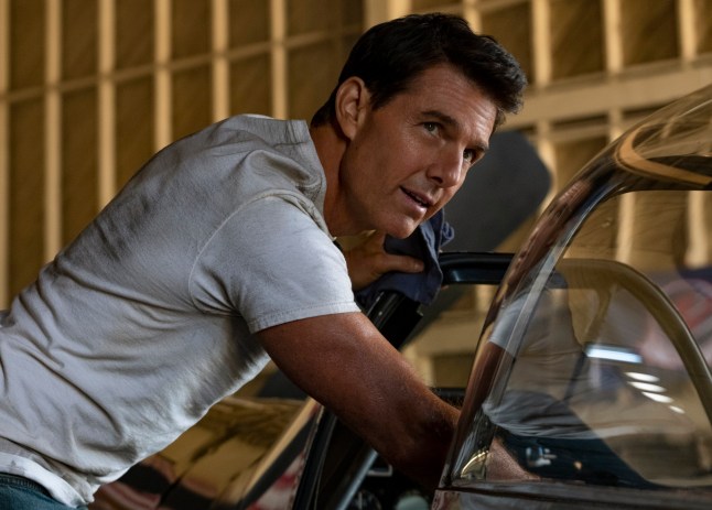 This image released by Paramount Pictures shows Tom Cruise portraying Capt. Pete "Maverick" Mitchell in a scene from "Top Gun: Maverick." Paramount Pictures on Wednesday postponed the release of the film, sending another of the fall???s top movies out of 2021 due to the rise in coronavirus cases and the delta variant. Instead of opening Nov. 19, the ???Top Gun??? sequel, starring Tom Cruise, will instead debut Memorial Day weekend next year, on May 27. (Scott Garfield/Paramount Pictures via AP)