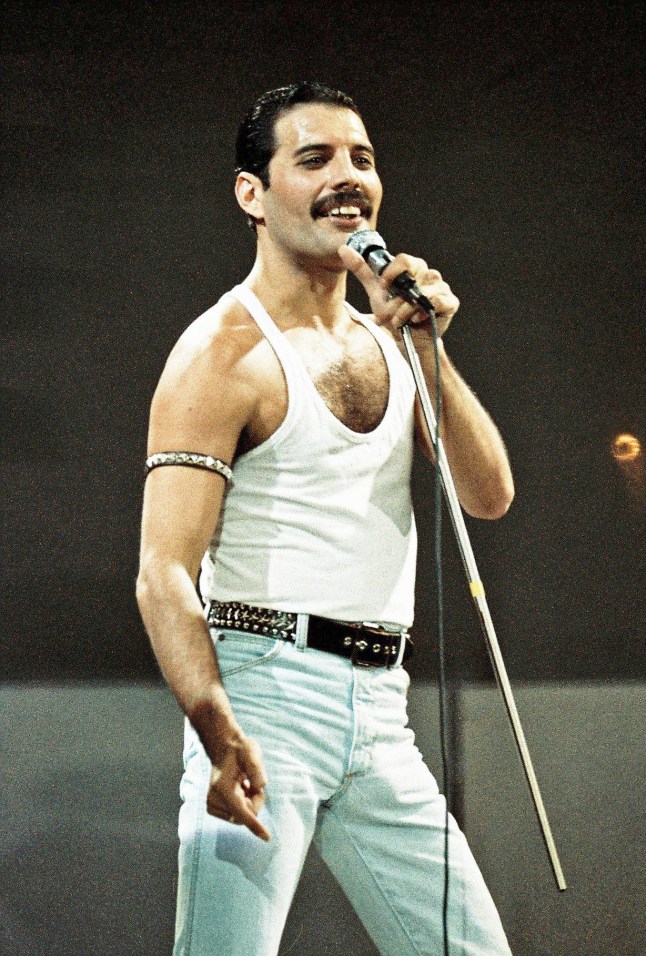 LONDON, UNITED KINGDOM - JULY 13: Freddie Mercury of Queen performs on stage at Live Aid on July 13th, 1985 in Wembley Stadium, London, England (Photo by Peter Still/Redferns)