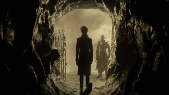 A still from the Netflix show The Sandman, showing the character in a tunnel