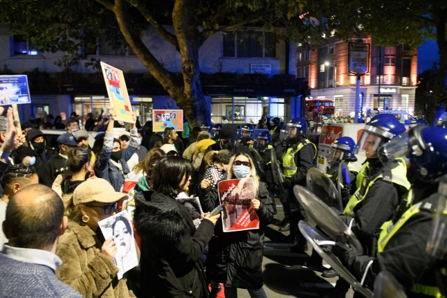 ?? Licensed to London News Pictures. 25/09/2022. London, UK. Protesters demonstrate outside the Kilburn Islamic Centre on Kilburn High Road in London following the death of Mahsa Amini in an Iranian detention centre. Photo credit: Peter Manning/LNP