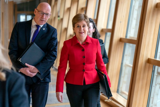 First Minister Nicola Sturgeon and Deputy First Minister John Swinney (left) arrive for First Minster's Questions, at the Scottish Parliament in Edinburgh. Picture date: Thursday January 19, 2023. PA Photo. See PA story SCOTLAND Questions. Photo credit should read: Jane Barlow/PA Wire