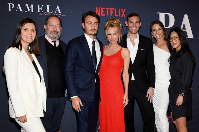 HOLLYWOOD, CALIFORNIA - JANUARY 30: (L-R) Julia Nottingham, Josh Braun, Brandon Thomas Lee, Pamela Anderson, Ryan White, Jessica Hargrave and Lisa Nishimura, VP, Independent Film & Documentary Features, Netflix attend the premiere of Netflix's "Pamela, a love story" at TUDUM Theater on January 30, 2023 in Hollywood, California. (Photo by Jon Kopaloff/Getty Images)