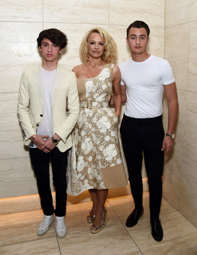 LOS ANGELES, CA - FEBRUARY 05: (L-R) Dylan Lee, actress Pamela Anderson and Brandon Lee attend the Los Angeles special screening and reception of "Connected" at Milk Studios on February 5, 2016 in Los Angeles, California. (Photo by Amanda Edwards/WireImage)