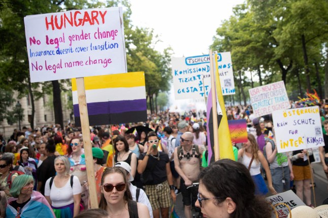 Participants of the "Rainbow Parade" (Pride Parade) on the Ringstrasse in Vienna on June 17, 2023. (Photo by Alex HALADA / AFP) (Photo by ALEX HALADA/AFP via Getty Images)