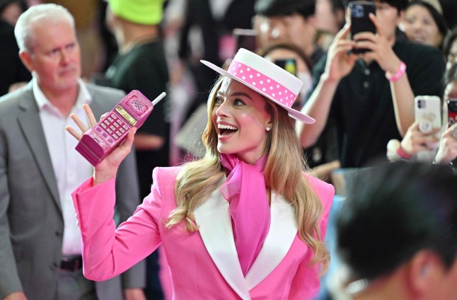 Australian actress Margot Robbie meets fans during a pink carpet event to promote her new film "Barbie" in Seoul on July 2, 2023. (Photo by Jung Yeon-je / AFP) (Photo by JUNG YEON-JE/AFP via Getty Images)