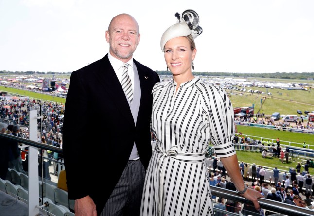 Mike and Zara Tindall pose for a photo on Derby Day of the 2023 Derby Festival at Epsom Downs Racecourse, Epsom. Picture date: Saturday June 3, 2023. PA Photo. See PA Story RACING Epsom. Photo credit should read: Steven Paston/PA Wire for The Jockey Club. RESTRICTIONS: Editorial Use only, commercial use is subject to prior permission from The Jockey Club/Epsom Downs Racecourse.