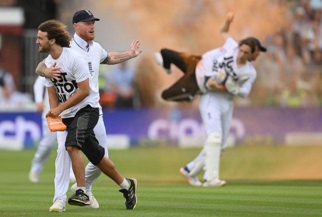 LONDON, ENGLAND - JUNE 28: Ben Stokes and Jonny Bairstow of England with 'Just Stop Oil' protestors during Day One of the LV= Insurance Ashes 2nd Test match between England and Australia at Lord's Cricket Ground on June 28, 2023 in London, England. (Photo by Philip Brown/Popperfoto/Popperfoto via Getty Images)