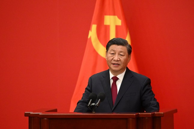 TOPSHOT - China's President Xi Jinping speaks after introducing members of the Chinese Communist Party's new Politburo Standing Committee, the nation's top decision-making body, in the Great Hall of the People in Beijing on October 23, 2022. (Photo by Noel CELIS / AFP) (Photo by NOEL CELIS/AFP via Getty Images)