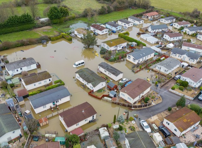 Drone image of the mass flooding of Primrose Hill Residential Park in Charlton Adam, Somerset. December 5 2023. Photo released December 5 2023. See SWNS story SWLNflood.