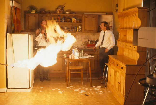 Comic actors Adrian Edmondson (left) and Rik Mayall in a scene from episode 'Gas' of the BBC television sitcom 'Bottom', July 4th 1991. (Photo by Don Smith/Radio Times/Getty Images)