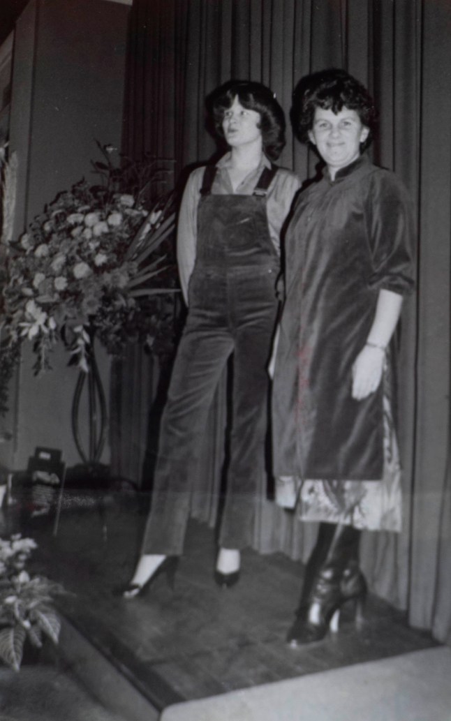 BNPS.co.uk (01202 558833) Pic: BNPS Pictured: Jill Cornick modelling a pair of Clark's at a fashion show in the 1970's in Blandford Forum, Dorset A pensioner who has worked at the same Clarks shoe shop for 68 years was given the boot with just two days' notice. Dedicated Jill Cornick began working at the store in Blandford, Dorset, as a 14-year-old in 1956. She worked continuously for the British retailer for the next seven decades, even postponing her honeymoon to attend a training course. After her son was born she put him in a play-pen in the shop so she could carry on working.