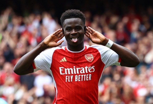 Soccer Football - Premier League - Arsenal v AFC Bournemouth - Emirates Stadium, London, Britain - May 4, 2024 Arsenal's Bukayo Saka celebrates scoring their first goal Action Images via Reuters/Paul Childs NO USE WITH UNAUTHORIZED AUDIO, VIDEO, DATA, FIXTURE LISTS, CLUB/LEAGUE LOGOS OR 'LIVE' SERVICES. ONLINE IN-MATCH USE LIMITED TO 45 IMAGES, NO VIDEO EMULATION. NO USE IN BETTING, GAMES OR SINGLE CLUB/LEAGUE/PLAYER PUBLICATIONS.