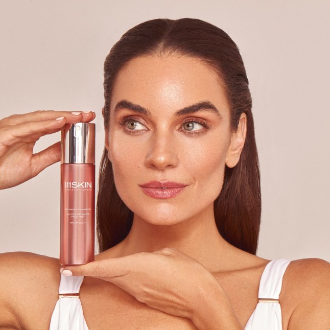 Image of model posing with 111SKIN All Day Radiance Mist