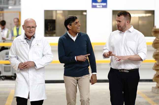 Prime Minister Rishi Sunak with Mark Meaney, Works Manager and Conservative parliamentary candidate Jonathan Gullis (right) during a visit to a pottery factory in Stoke On Trent, Staffordshire, while on the General Election campaign trail. Picture date: Tuesday May 28, 2024. PA Photo. See PA story POLITICS Election. Photo credit should read: Aaron Chown/PA Wire