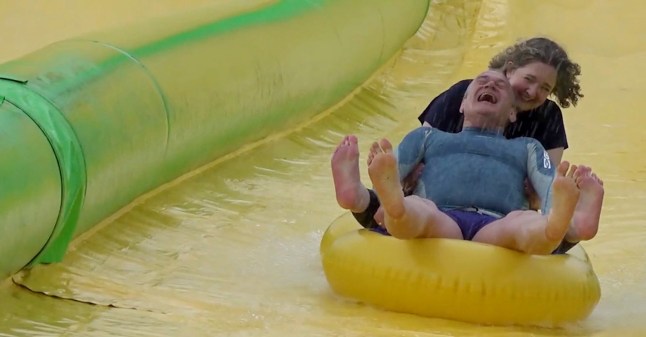 Liberal Democrat leader Sir Ed Davey rides down the Ultimate Slip n Slide attraction near Frome, Somerset, while on the General Election campaign trail. Picture date: Thursday May 30, 2024. PA Photo. See PA story POLITICS Election LibDems. Photo credit should read: Rod Minchin/PA Wire