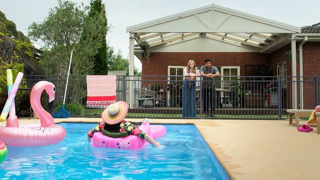 Haz and Mackenzie watch Mrs Punt in the pool in Neighbours