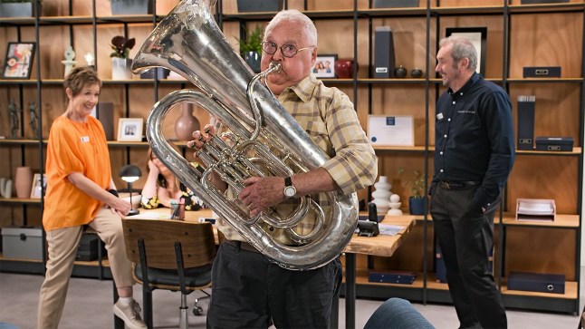 Harold plays his tuba in Neighbours as Karl and Susan watch on