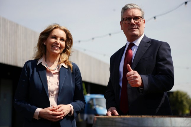 DOVER, ENGLAND - MAY 10: Labour leader Keir Starmer gives a thumbs up alongside MP for Dover Natalie Elphicke as he announces Labour's plan to stop illegal small boat crossings on May 10, 2024 in Dover, England. The Labour leader announced plans for border security and tackling the issue of small boat crossings. Starmer is expected to announce plans for a new Border Security Command, new counter-terror powers, and new specialist enforcement officers and investigators as part of pledge to change what he calls the Conservative Party's 'talk tough, do nothing culture' on border control. Labour says part of the proposals would be funded by diverting money currently being used for the government's Rwanda deportation policy. (Photo by Dan Kitwood/Getty Images)