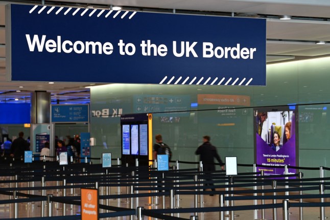 UK border signage is pictured at the passport control in Arrivals in Terminal 2 at Heathrow Airport in London on July 16, 2019 (Photo by Daniel LEAL / AFP) (Photo by DANIEL LEAL/AFP via Getty Images)