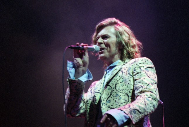 Mandatory Credit: Photo by Julian Makey/REX/Shutterstock (322891aa) David Bowie performing Glastonbury Rock Festival, Pilton, Somerset, Britain UK - Jun 2000 Glastonbury Festival of Contemporary Performing Arts, is a five-day festival of contemporary performing arts that takes place in Pilton, Somerset, in England. The event started in 1970 and is held usually every year. In addition to contemporary music, the festival hosts dance, comedy, theatre, circus, cabaret, and other arts. Leading pop and rock artists have headlined, alongside thousands of others appearing on smaller stages and performance areas.