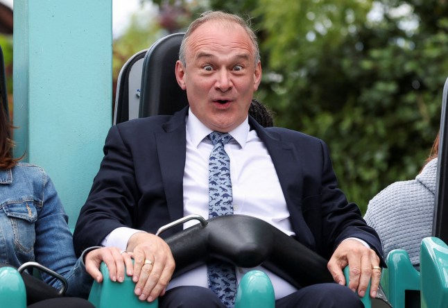 British leader of the Liberal Democrats party Ed Davey reacts as he sits on a ride called "Rush" during a Liberal Democrats general election campaign event at Thorpe Park in London, Britain, June 10, 2024. REUTERS/Suzanne Plunkett