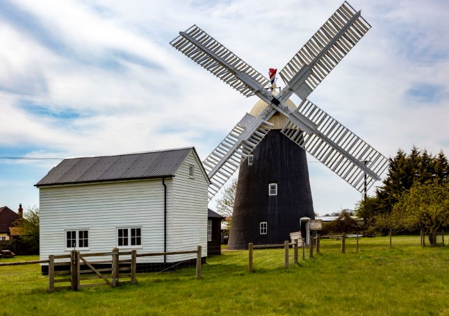 Historic tower windmill, Thelnetham, Suffolk, England, UK also known as Button's Mill. (Photo by: Geography Photos/Universal Images Group via Getty Images)