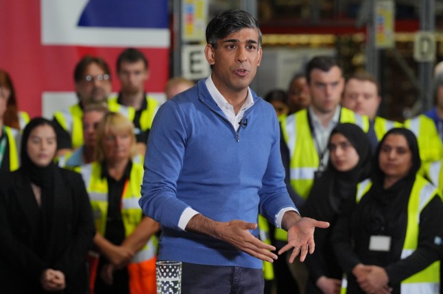 Prime Minister Rishi Sunak talking to staff during a visit to Well Healthcare Supplies a pharmaceutical packing and distribution centre in Stoke-on-Trent, Staffordshire, while on the General Election campaign trail. Picture date: Monday July 1, 2024. PA Photo. See PA story POLITICS Election. Photo credit should read: Jonathan Brady/PA Wire