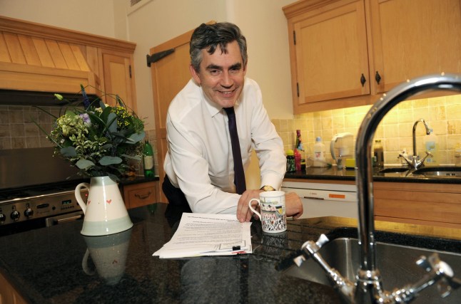 Mandatory Credit: Photo by Colin Davey/Shutterstock (938673a) Gordon Brown having a coffee and reading his notes in the kitchen Gordon Brown at 10 Downing Street, London, Britain - 01 Oct 2008