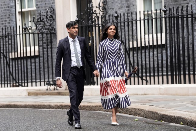 Outgoing Conservative Prime Minister Rishi Sunak with his wife Akshata Murty leaving after giving a speech in Downing Street, London, following his party's landslide defeat to the Labour Party in the 2024 General Election. Picture date: Friday July 5, 2024. PA Photo. See PA story POLITICS Election. Photo credit should read: Stefan Rousseau/PA Wire