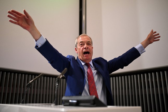 Nigel Farage, Reform UK leader and new MP for Clacton, reacts as a protester interrupts his presentation of the programme of newly elected Reform UK MPs in London on July 5, 2024, a day after Britain held a general election. As of 1200 GMT on Friday, the Labour party had won 412 seats in the House of Commons with only two results left to declare, giving it a majority of more than 170. The Conservative Party won just 121 seats -- a record low -- with the right-wing vote apparently spliced by Nigel Farage's anti-immigration Reform UK party. (Photo by Oli SCARFF / AFP) (Photo by OLI SCARFF/AFP via Getty Images)